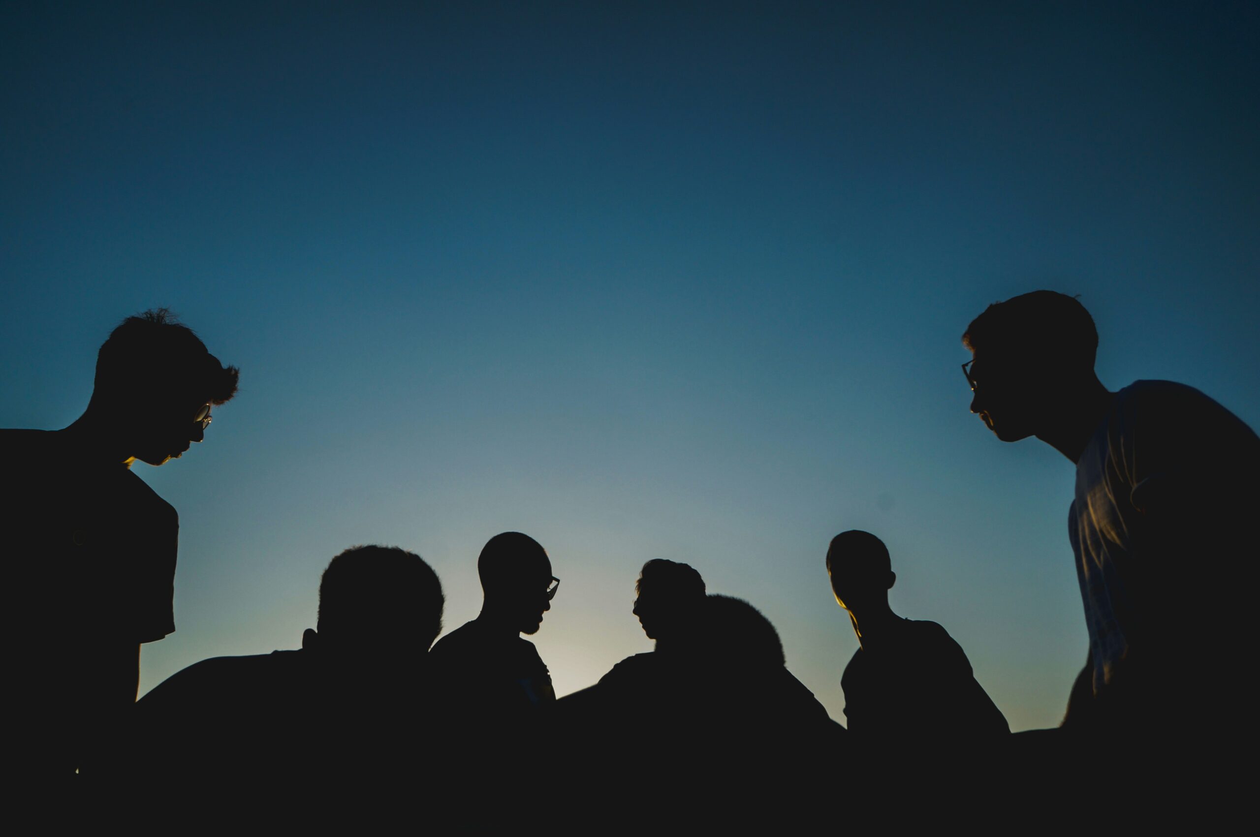 7 people in silhouette